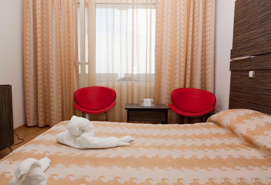 Hotel Capitol Юпитер Стая снимка